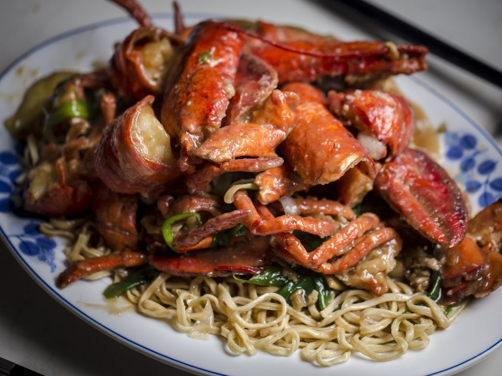 Lobster on a plate of noodles